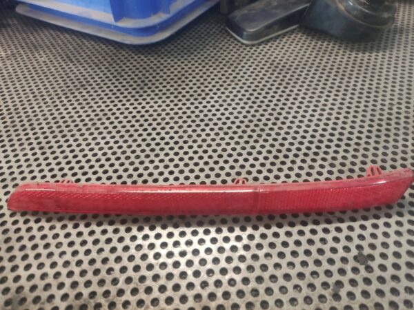 ODBLASK LEWY TYŁ VW T5 7E0945105A