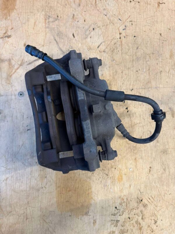 ZACISK HAMULCOWY PRAWY RENAULT TRAFIC II 2.0