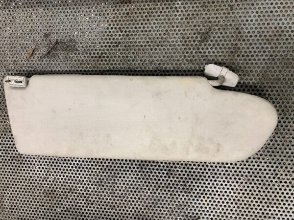 OSŁONA PRZECIWSŁONECZNA LEWA VW T5 3B0857561B