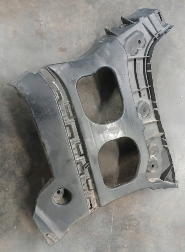 ŚLIZG ZDERZAKA PRAWY TYŁ FORD COURIER ET7617A881AJ