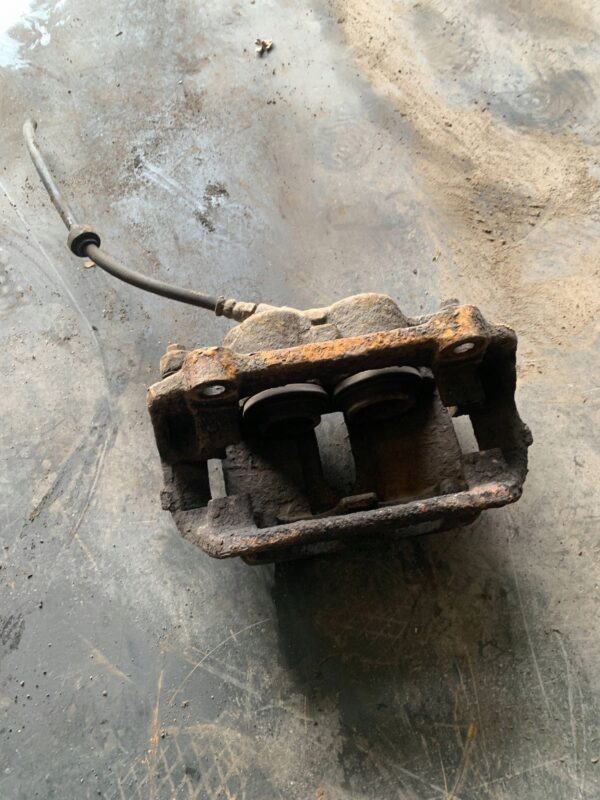 ZACISK HAMULCOWY PRZEDNI TRAFIC II VIVARO 003506 65921